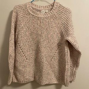 The brand of the sweater is GAP. The color of the sweater is cream and confetti.